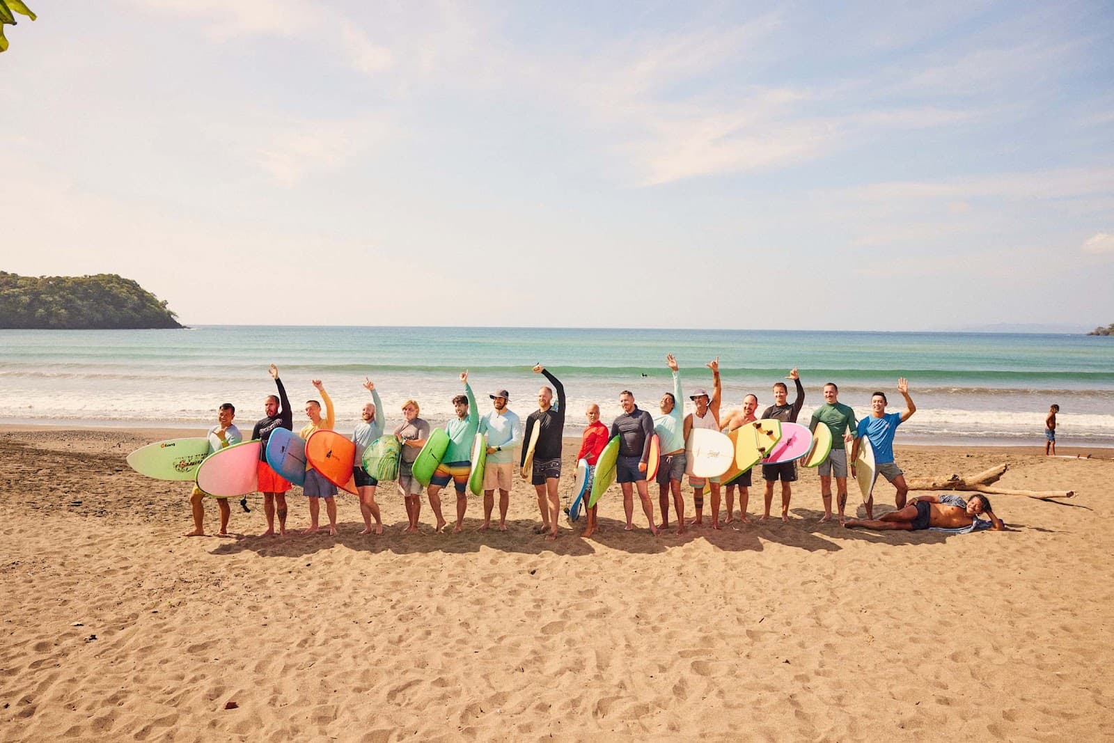 Surfers posing together